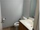 Bathroom featuring a toilet, sink, and mirror at 2679 Jacyra Ave, Las Vegas, NV 89121