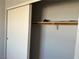 White sliding closet door with a single shelf and rod, simple and functional at 2679 Jacyra Ave, Las Vegas, NV 89121