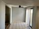 Tile dining room with ceiling fan and sliding glass door at 2679 Jacyra Ave, Las Vegas, NV 89121