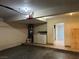 Interior of garage with washer/dryer hookups and water heater adjacent to the house at 2679 Jacyra Ave, Las Vegas, NV 89121