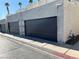 The garage doors for the building set in a desert landscape at 2679 Jacyra Ave, Las Vegas, NV 89121