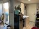 View of the kitchen's back door leading to a small patio area at 2679 Jacyra Ave, Las Vegas, NV 89121