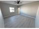 Spacious bedroom with sleek flooring and a window with view at 2700 W Carnation Way, Pahrump, NV 89048