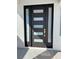 Modern style black door with glass panels at 2700 W Carnation Way, Pahrump, NV 89048