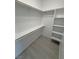 Walk-in closet with custom shelving and ample storage space at 2700 W Carnation Way, Pahrump, NV 89048