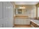 Main bathroom with double vanity, soaking tub, and separate shower at 2721 Tahiti Isle Ave, North Las Vegas, NV 89031