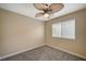 Bright bedroom with ceiling fan and carpet at 2721 Tahiti Isle Ave, North Las Vegas, NV 89031