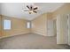 Bright and airy bedroom, featuring carpet and ceiling fan at 2721 Tahiti Isle Ave, North Las Vegas, NV 89031