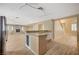 Kitchen with island, wine cooler, and views to Gathering room at 2721 Tahiti Isle Ave, North Las Vegas, NV 89031