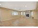 Living room with hardwood floors and stone fireplace at 2721 Tahiti Isle Ave, North Las Vegas, NV 89031