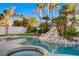 Inviting pool and spa with waterfall feature at 2721 Tahiti Isle Ave, North Las Vegas, NV 89031