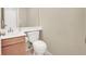 Small bathroom with single sink and toilet at 2823 Camelback Ln, Henderson, NV 89074