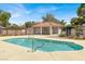 Community pool with a covered patio area at 2823 Camelback Ln, Henderson, NV 89074