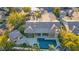 Aerial view of estate featuring a swimming pool, detached living area, and manicured backyard at 308 Bayswater Ct, Las Vegas, NV 89145