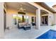 Backyard patio with sofa, table, flower pot and view of the pool at 308 Bayswater Ct, Las Vegas, NV 89145