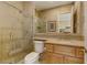 Well-maintained bathroom with a glass shower, vanity, and neutral tile at 308 Bayswater Ct, Las Vegas, NV 89145