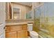 Nicely tiled bathroom featuring glass shower doors and a single sink vanity at 308 Bayswater Ct, Las Vegas, NV 89145