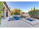 Backyard pool and spa with desert landscaping and blue skies at 308 Bayswater Ct, Las Vegas, NV 89145