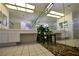 Spa-like bathroom with double sinks and pebble floor at 3126 Asoleado Cir, Las Vegas, NV 89121