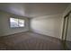 Bright bedroom with carpet and large window at 3126 Asoleado Cir, Las Vegas, NV 89121