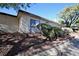 Side view showcasing stucco exterior and landscaping at 3126 Asoleado Cir, Las Vegas, NV 89121