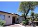 Inviting front entrance featuring a stone walkway, quaint desert plants, and double entry doors at 3126 Asoleado Cir, Las Vegas, NV 89121