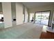 Living room with high ceilings, fireplace, and lots of natural light at 3126 Asoleado Cir, Las Vegas, NV 89121