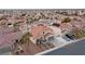 Aerial view of house and surrounding neighborhood at 319 Horse Pointe Ave, North Las Vegas, NV 89084