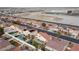 Aerial view of houses with pools and solar panels at 319 Horse Pointe Ave, North Las Vegas, NV 89084