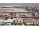 Aerial view of neighborhood, showcasing homes and school at 319 Horse Pointe Ave, North Las Vegas, NV 89084