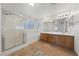 Bathroom features double sinks, a soaking tub and shower at 319 Horse Pointe Ave, North Las Vegas, NV 89084