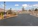 Welcoming entrance of the neighborhood with well-maintained landscaping and a secure gate at 319 Horse Pointe Ave, North Las Vegas, NV 89084