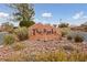 Neighborhood entrance sign surrounded by desert landscaping, creating a serene welcome at 319 Horse Pointe Ave, North Las Vegas, NV 89084