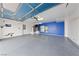 Bright Garage with high ceilings and epoxy floor at 319 Horse Pointe Ave, North Las Vegas, NV 89084