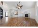 Living room featuring hardwood floors and fireplace at 319 Horse Pointe Ave, North Las Vegas, NV 89084