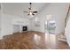 Living room with hardwood floors, fireplace and sliding doors at 319 Horse Pointe Ave, North Las Vegas, NV 89084