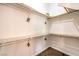 Large walk-in closet with ample shelving and hanging space at 320 Mindoro Ave, North Las Vegas, NV 89031