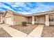 Front view of the house, showing walkway and porch at 320 Mindoro Ave, North Las Vegas, NV 89031