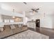 Living room with herringbone floors and a view of the kitchen at 320 Mindoro Ave, North Las Vegas, NV 89031