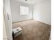 Empty bedroom with carpeted floors at 3807 Aspen Creek Ave, North Las Vegas, NV 89031