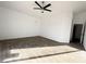 Spacious bedroom featuring tile floors and ceiling fan at 3807 Aspen Creek Ave, North Las Vegas, NV 89031