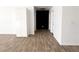 Clean hallway with tile flooring and white walls at 3807 Aspen Creek Ave, North Las Vegas, NV 89031