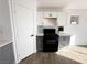 Modern kitchen with black appliances and gray cabinets at 3807 Aspen Creek Ave, North Las Vegas, NV 89031