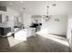 Modern kitchen with island, gray and white cabinets at 3807 Aspen Creek Ave, North Las Vegas, NV 89031