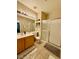 Clean bathroom with a single sink vanity, toilet, and shower at 3815 Juno Beach St # 203, Las Vegas, NV 89129