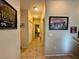 Clean hallway with light walls and access to bedrooms and closets at 3815 Juno Beach St # 203, Las Vegas, NV 89129