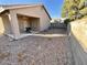 Backyard with covered patio and gravel landscaping at 4604 Possum Berry Ln, North Las Vegas, NV 89081