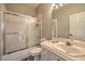 Bathroom featuring a shower-tub combo, toilet, and vanity with a sink at 4731 Norwegian St, Las Vegas, NV 89147