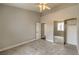 Bedroom featuring carpet, a mirrored closet, and neutral paint at 4731 Norwegian St, Las Vegas, NV 89147