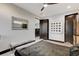 Serene bedroom with window, bed, and bench, great for relaxing at 5 Highland Cove Ln, Henderson, NV 89011